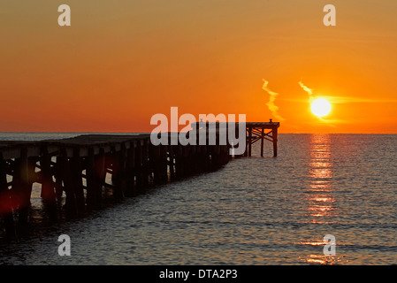 Sunrise at a jetty leading out into the sea, Alcúdia, Majorca, Balearic Islands, Spain Stock Photo