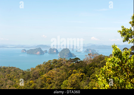 Forested Karst islands rising from the sea, view of Phang Nga Bay from Snakehead mountain, Andaman Sea, Ao Nang, Krabi Province Stock Photo