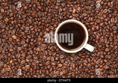 Cup of coffee with coffee beans Stock Photo