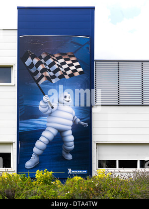 Clermont- Ferrand, France, poster on the facade of the Michelin tire factory Stock Photo