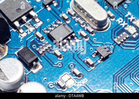 Microchips by other elements on a circuit board Stock Photo