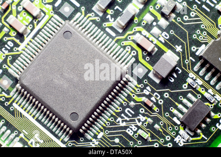 Microchips by other elements on a circuit board Stock Photo