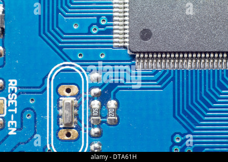 Microchips by other elements on a circuit board Stock Photo