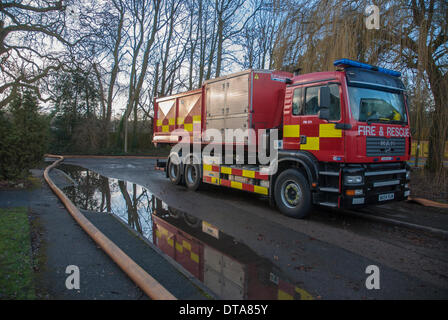 Marlow, UK. 13th Feb, 2014. A High Volume Pump (HVP) has been drafted in from the Staffordshire Fire and Rescue Service to assist with flood operations in Marlow, Buckinghamshire, UK. A severe storm brought winds of more than 100 MPH to some parts of the country. Forecasters are predicting more wet and windy weather to come. Credit:  Peter Manning/Alamy Live News Stock Photo