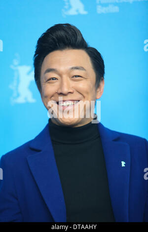 Berlin, Germany. 13th Feb, 2013. Chinese actor Huang Bo poses for photos during a photocall to promote the movie 'No Man's Land' at the 64th Berlinale International Film Festival in Berlin, Germany, on Feb. 13, 2013. Credit:  Zhang Fan/Xinhua/Alamy Live News Stock Photo