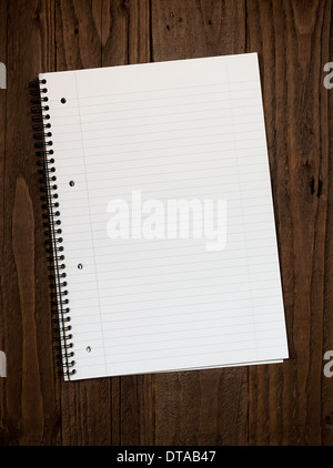 Empty lined ringbinder page with copy space for your message on a dark Stock Photo