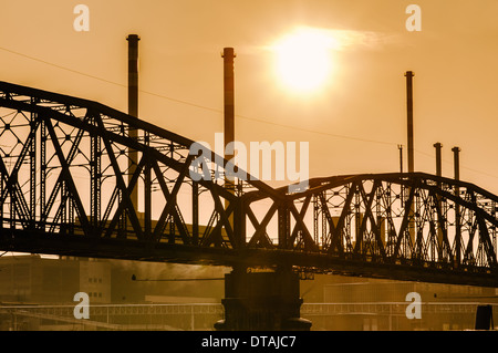 Bridge and industrial buildings on late Afternoon