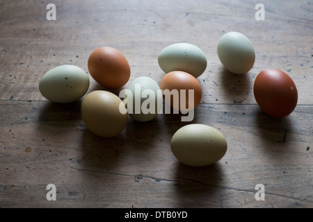 Eggs on wooden table, close-up Stock Photo