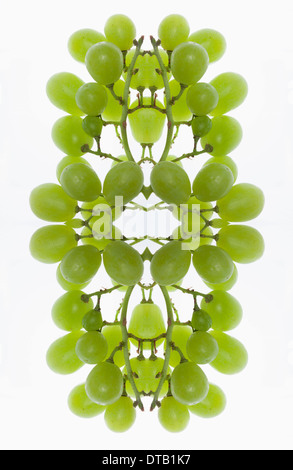 A digital composite of mirrored images of an arrangement of grapes Stock Photo