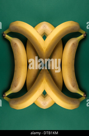A digital composite of mirrored images of an arrangement of bananas Stock Photo