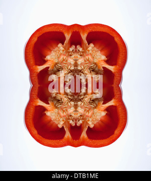 A digital composite of mirrored images of cross sections of red bell peppers Stock Photo