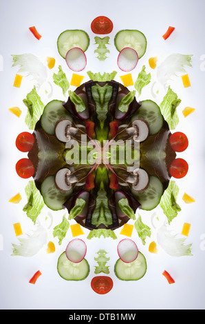 A digital composite of mirrored images of pieces of a mixed vegetable salad Stock Photo