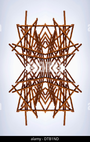 A digital composite of mirrored images of an arrangement of pretzels Stock Photo