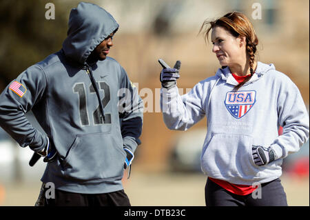 Feb. 13, 2014 - Allen, TX, United States of America - Jennifer Welter (right) visits with a teammate while waiting to participate in a drill during practice Thursday, February 13, 2014, in Allen, Texas. The 5-foot-2-inch, 130 pound Welter is the first woman to try out for a professional football team at a position other than kicker, she is trying to make the Texas Revolution of the Arena Football League, as a running back. Stock Photo