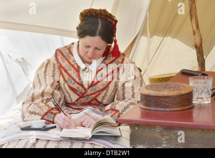 Civil-war era re-enactor working on a watercolor during the Civil War remembrance at Greenfield Village May 26, 2013. Stock Photo