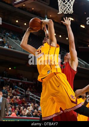 Los Angeles, CA, USA. 13th Feb, 2014. February 13, 2014 Los Angeles, CA.USC Trojans center (55) Omar Oraby battles to get his shot off during the Pac 12 game between the UCLA Bruins and the USC Trojans at the Galen Center in Los Angeles, California. The UTAH Utes defeated the USC Trojans 79-71.(Mandatory Credit: Juan Lainez / MarinMedia.org / Cal Sport Media) Credit:  csm/Alamy Live News Stock Photo