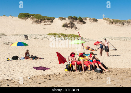 Lifeguards on duty sitting on the beach at Sedgefield, Eastern Cape, South Africa Stock Photo