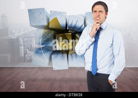 Composite image of thinking businessman touching his chin Stock Photo