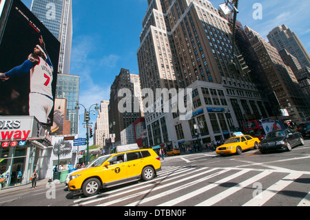 Yellow Cabs in Midtown Manhattan, New York City, USA Stock Photo