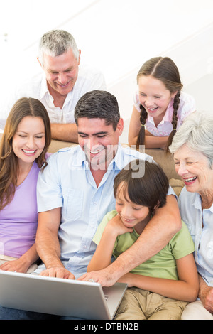 Multigeneration family using laptop Stock Photo