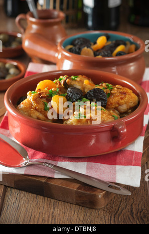 Pollo a la Catalana. Catalan chicken with dried fruit and pine nuts Spain Food Stock Photo