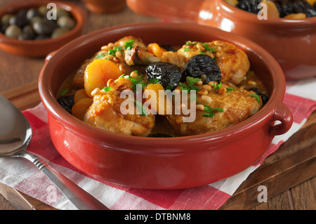 Pollo a la Catalana. Catalan chicken with dried fruit and pine nuts Spain Food Stock Photo