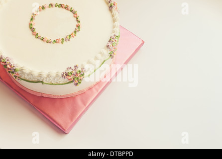 Details of birthday cake isolated on white background. Stock Photo