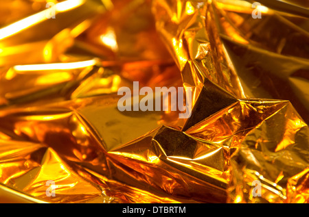 full frame creased gold foil background Stock Photo