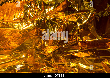 full frame creased gold foil background Stock Photo