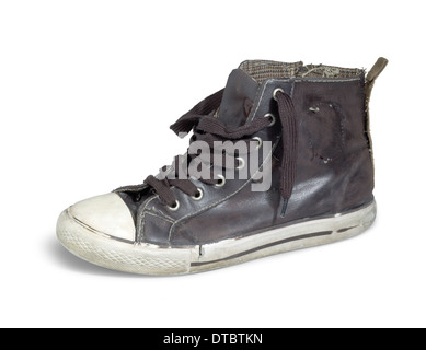 a old brown sneaker in white back Stock Photo