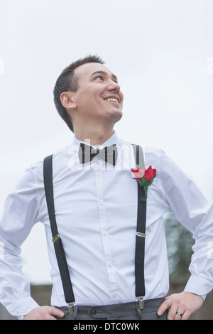 Informal portrait of smiling groom at wedding Stock Photo