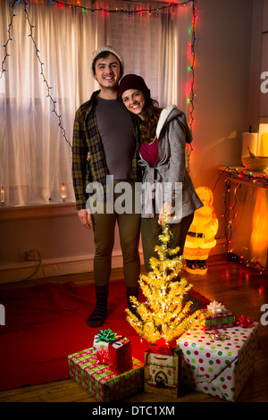Portrait of happy young couple at christmas Stock Photo