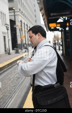 Businessman commuting to work Stock Photo
