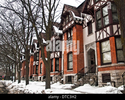 brownstone buildings in a city in winter Stock Photo