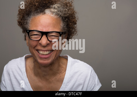 Studio portrait of happy senior woman Stock Photo
