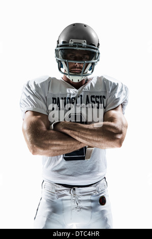 Studio portrait of american football player Stock Photo