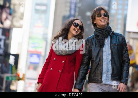 Young tourist couple holding hands, New York City, USA Stock Photo