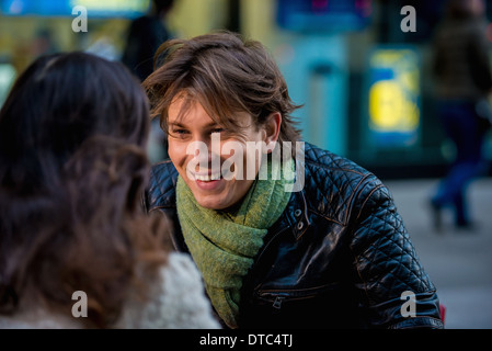 Young couple at sidewalk cafe, New York City, USA Stock Photo
