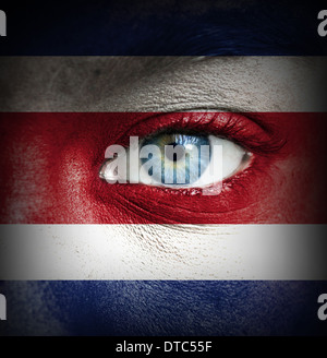 Human face painted with flag of Costa Rica Stock Photo