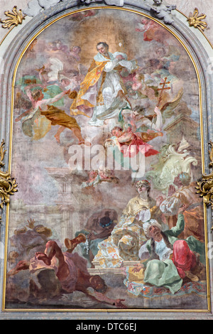 JASOV - JANUARY 2, 2014: Baroque side altar and paint of st. Norbert from Premonstratesian cloister in Jasov Stock Photo