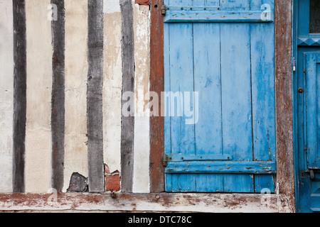 Painted shutter of a 16th century half-timbered building in Honfleur, Normandy, France Stock Photo