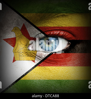 Human face painted with flag of Zimbabwe Stock Photo