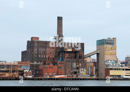 The Domino Sugar Refinery, seen from the East River in New York City, USA Stock Photo