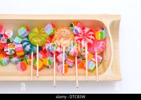 colorful candies on bamboo plate Stock Photo