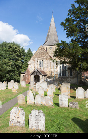 St James' Church, Shere, Surrey, southern England, a traditional village country church with spire and graveyard Stock Photo