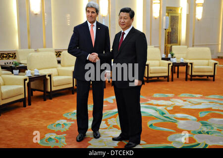 US Secretary of State John Kerry meets with Chinese President Xi Jinping in the Great Hall of the Pepole February 14, 2014 in Beijing, China. Stock Photo