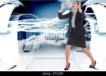 Composite image of angry businesswoman gesturing Stock Photo