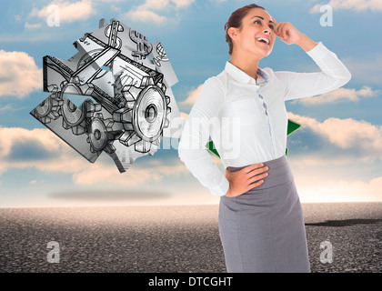 Composite image of smiling thoughtful businesswoman Stock Photo