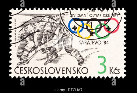 Postage stamp from Czechoslovakia depicting two ice hockey players, issued for the 1984 Winter Olympic games in Sarajevo. Stock Photo