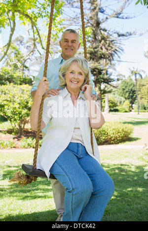 Portrait of a happy mature couple at park Stock Photo